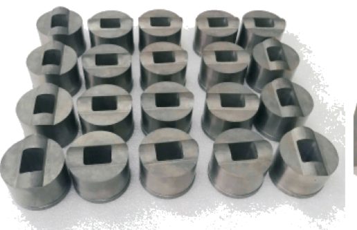 Non-magnetic carbide forming mold inserts